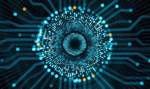 Circular digital pattern made of glowing blue and yellow dots forming a technology-inspired interface on a dark background.