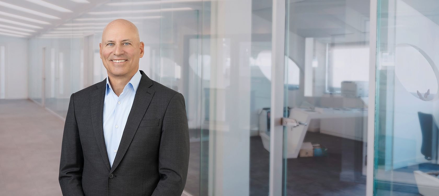 Professional portrait of Adam M. Cohen