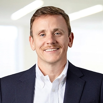 Professional headshot of Aaron W. Barker