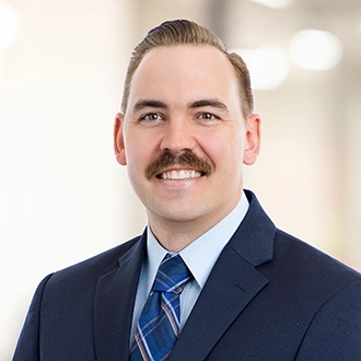 Professional headshot of Kyle BJ. Beczkiewicz