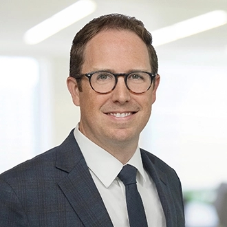 Professional headshot of Ethan J. Bercot