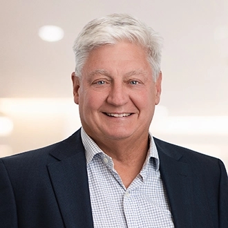 Professional headshot of Peter L. Coffey