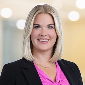 Professional headshot of Ashley M. Cowie