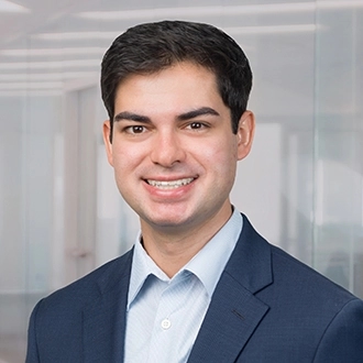 Professional headshot of Christian A. Delgado