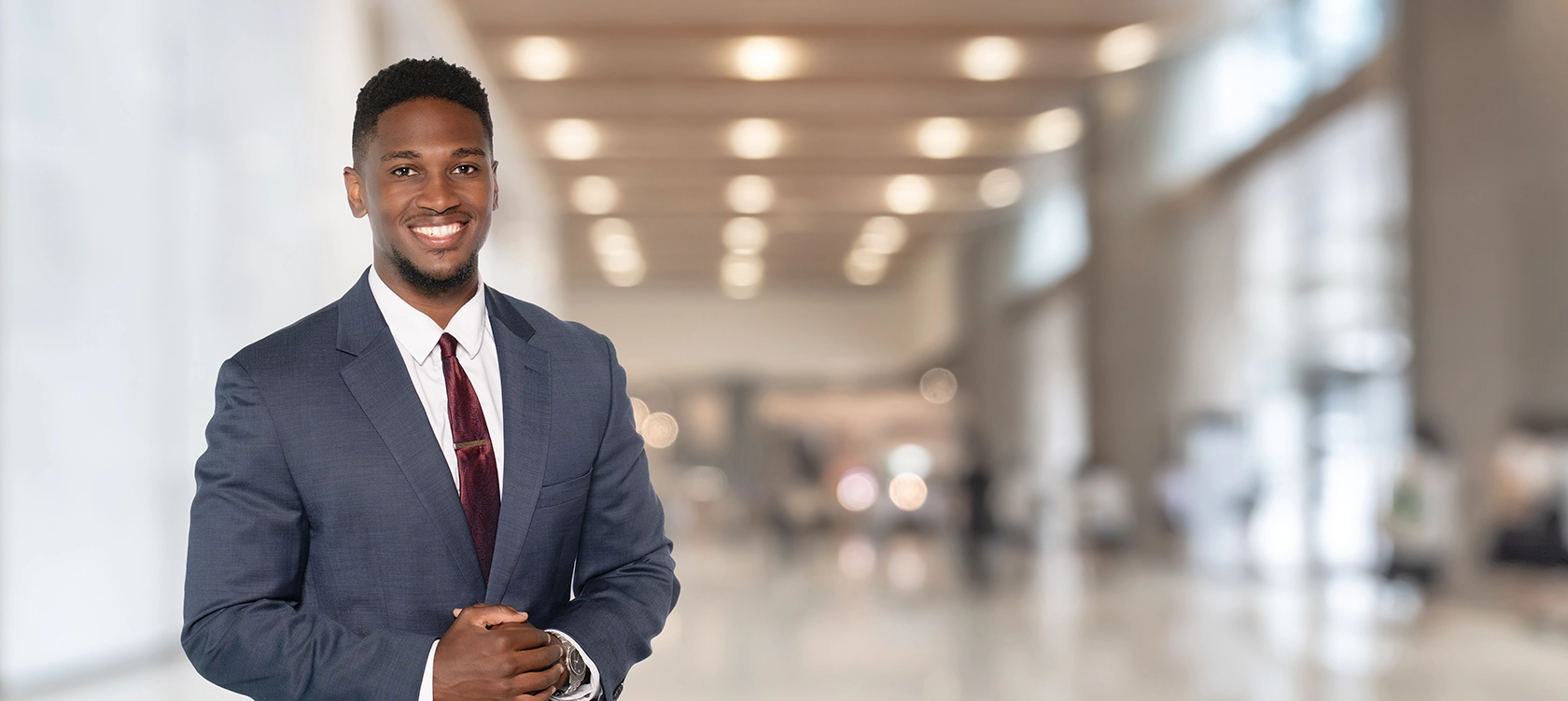 Professional portrait of Kamau C. Faines