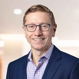 Professional headshot of Darren G. Gibson