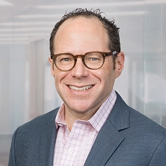 Professional headshot of Adam J. Goldblatt