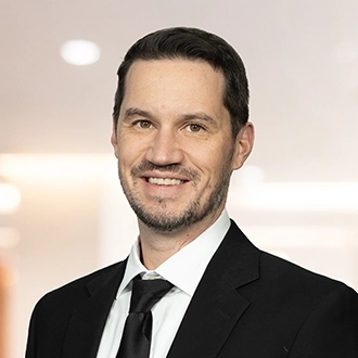 Professional headshot of Brenton L. Gragg