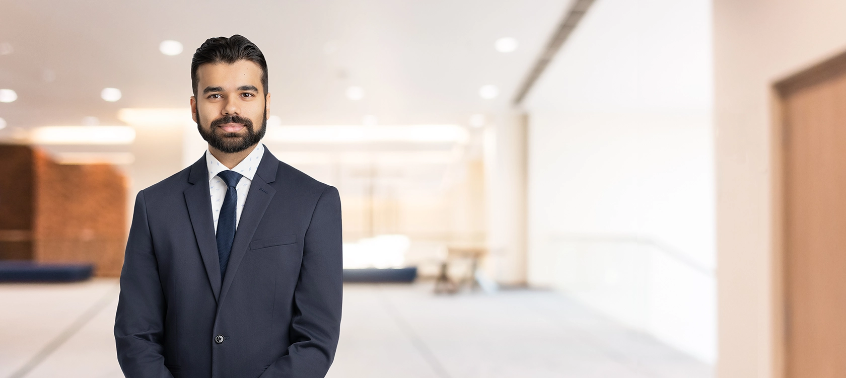 Professional portrait of Masroor Ahmad