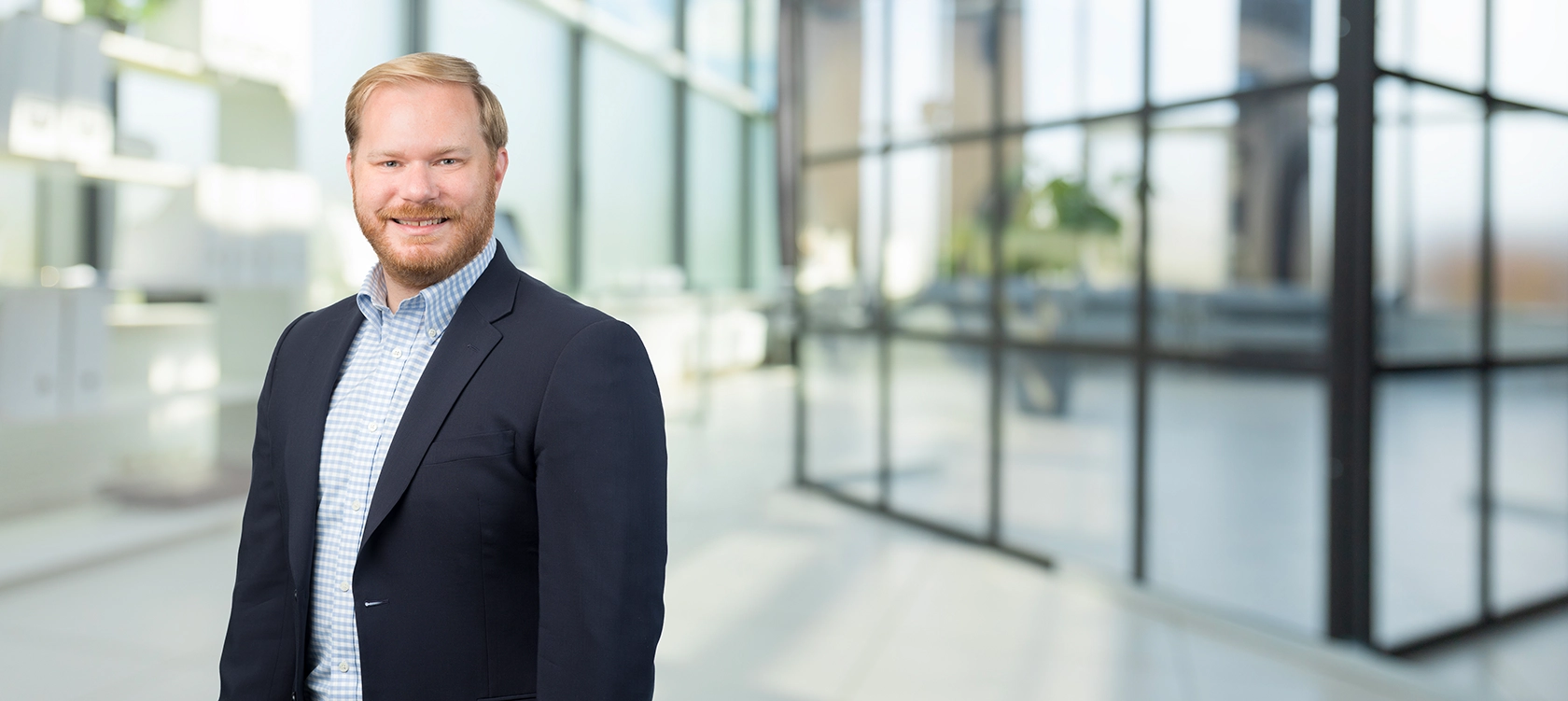 Professional portrait of Justin G. May