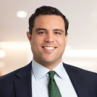 Professional headshot of Alexander M. DeGuire