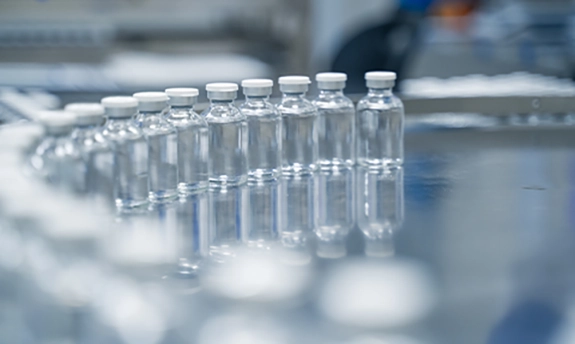 Medicine vials on a production line.