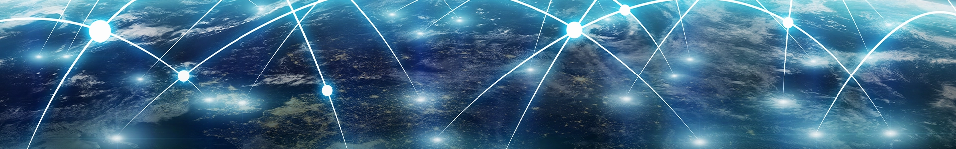 Close up view of Earth from space with glowing lines and connection points illustrating a global digital network.