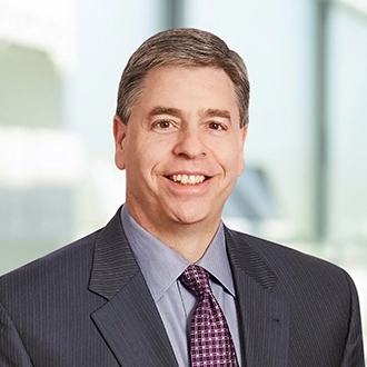 Professional headshot of Edward S. Sarskas