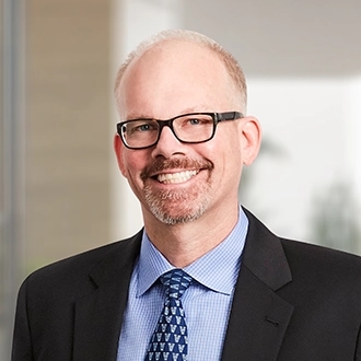 Professional headshot of Christopher M. Tobin