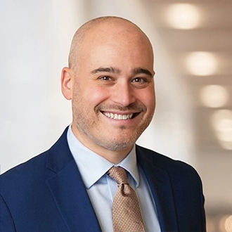 Adam E. Witkov