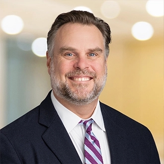 Lance E. Mueller